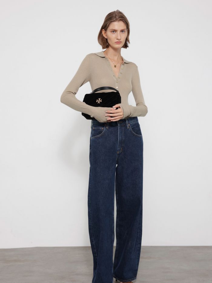 מכנסי ג’ינס עם קימור - בגדים