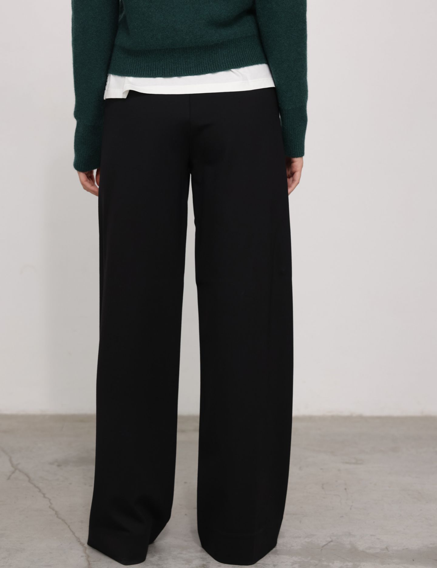 מכנסיים ארוכים גזרה מתרחבת - בגדים