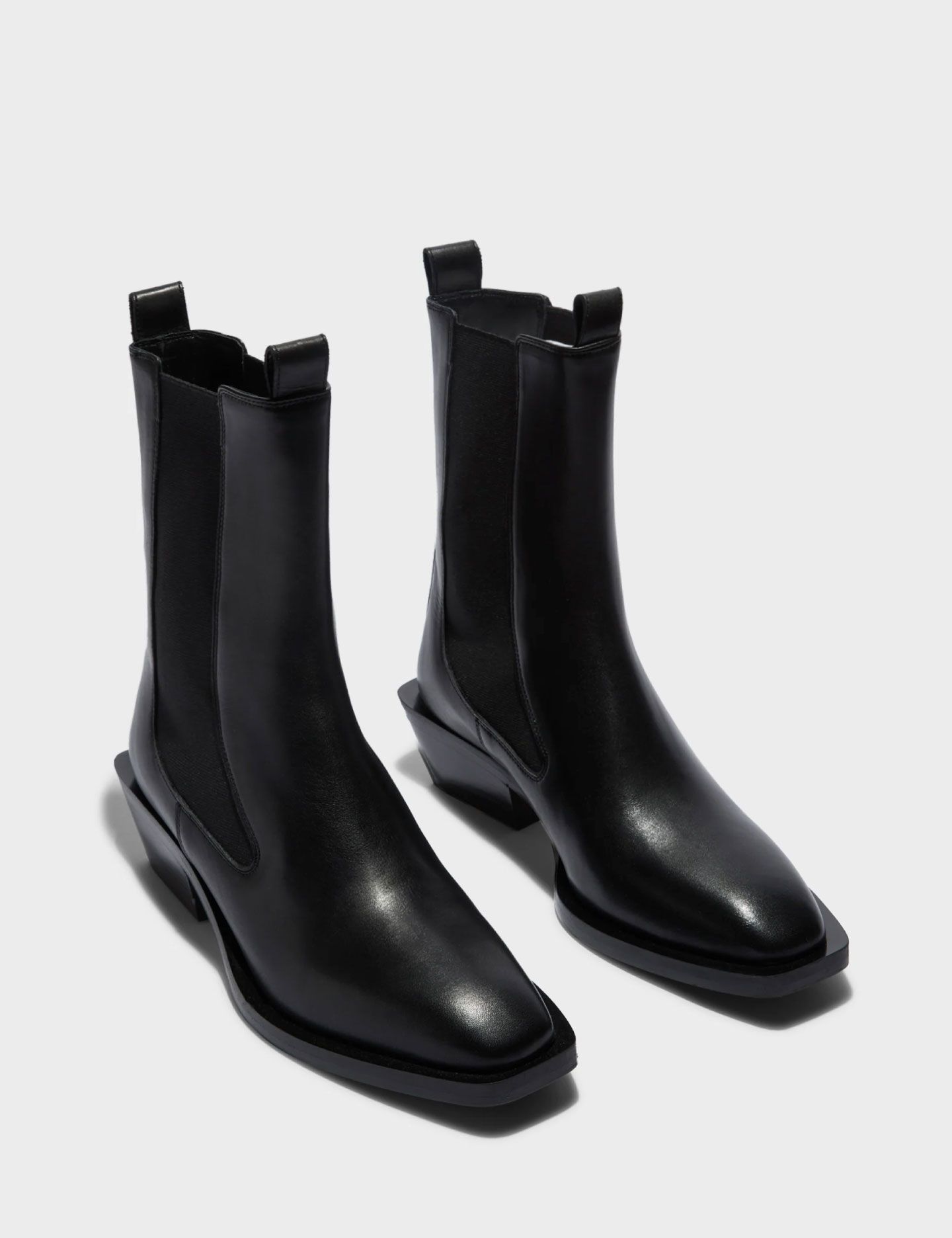 מגפוני עקב מעור - נעליים